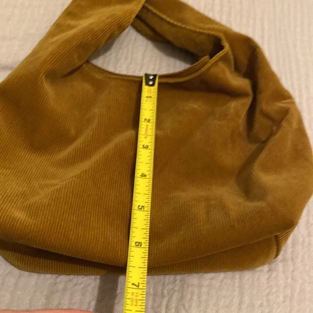 MERIT Elegant Tan Knot Cosmetics Bag